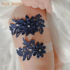 Sexy Lace Flower design navy blue lace garters with floral patterns and pearl accents on white lace bands