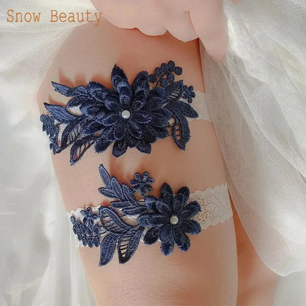 Sexy Lace Flower design navy blue lace garters with floral patterns and pearl accents on white lace bands