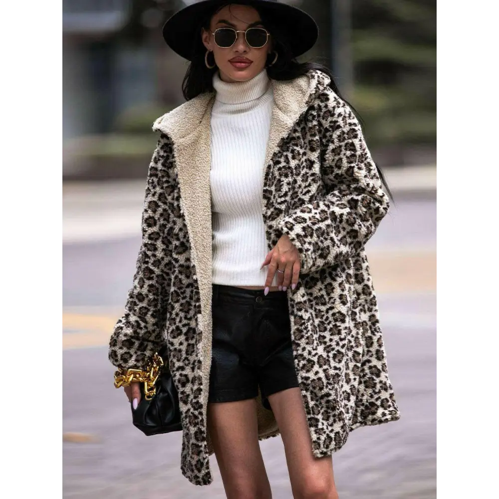 Elevate your wardrobe with the shiny leopard print hooded teddy coat $85 basic style with a chic twist, perfect