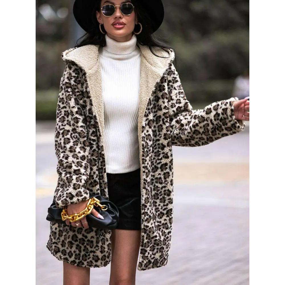 Elevate your wardrobe with the shiny leopard print hooded teddy coat $85 basic style with a chic twist, perfect