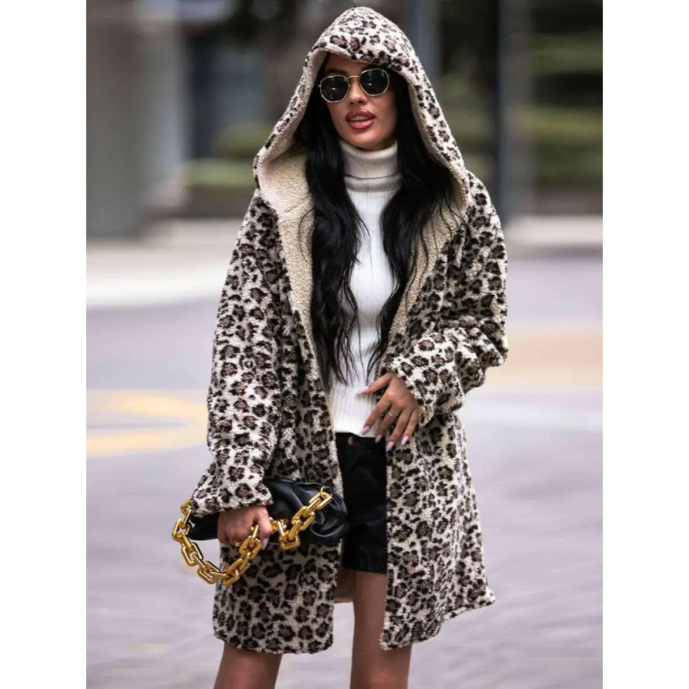 Elevate your wardrobe with the shiny leopard print hooded teddy coat $85 basic style with a chic twist, perfect