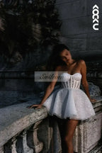 Short Wedding Dress in white tulle with sweetheart neckline and shiny glitter detail on fitted bodice and flared skirt