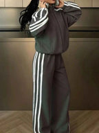 Side Stripes Zip Up Top and matching pants set in dark grey with white side stripes and zipper closure