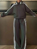 Grey two-piece tracksuit featuring a Side Stripes Zip Up Top with white contrasting side stripes and matching pants