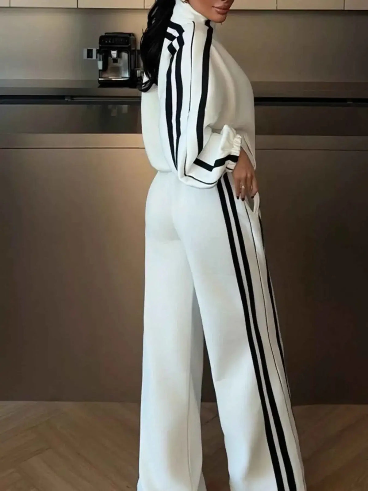 Side Stripes Zip Up Top and pants set in white with black double stripes on sleeves and pant legs, featuring a zip closure and contrasting stitching