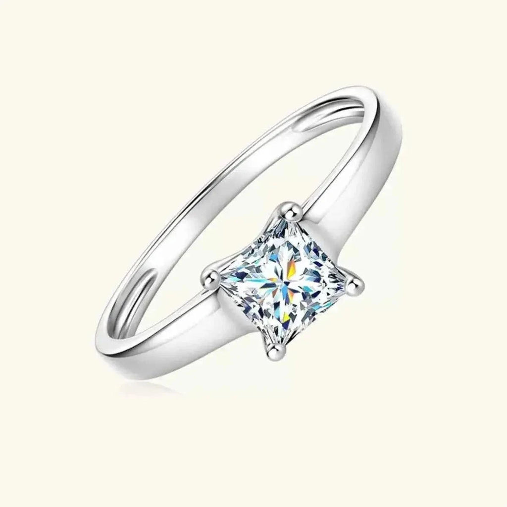 Silver-Plated Minimalist Ring featuring a sleek silver-plated band with a single square-cut clear zircon stone centerpiece