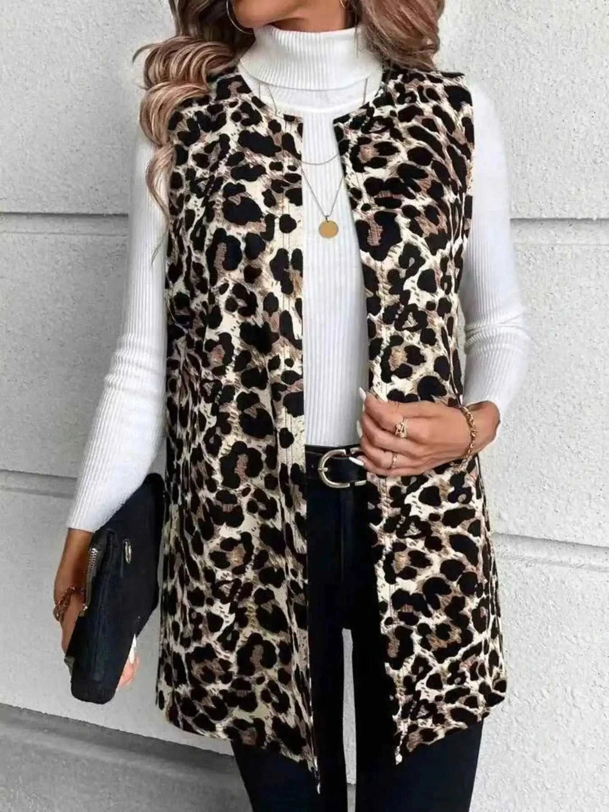 Sleeveless Leopard Print Vest in stretch polyester with brown and black pattern, featuring front pockets and a collarless design