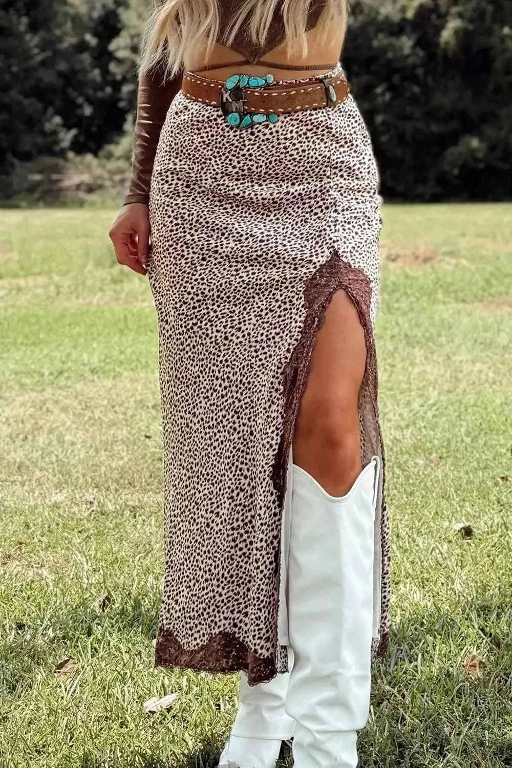 Slit Animal Print Skirt in beige and brown with lace detail and a high side split worn with a brown belt and white boots