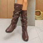 Slouchy Mid-Calf Boots in dark brown PU leather with a ruched texture and flat rubber soles, mid-calf height design.
