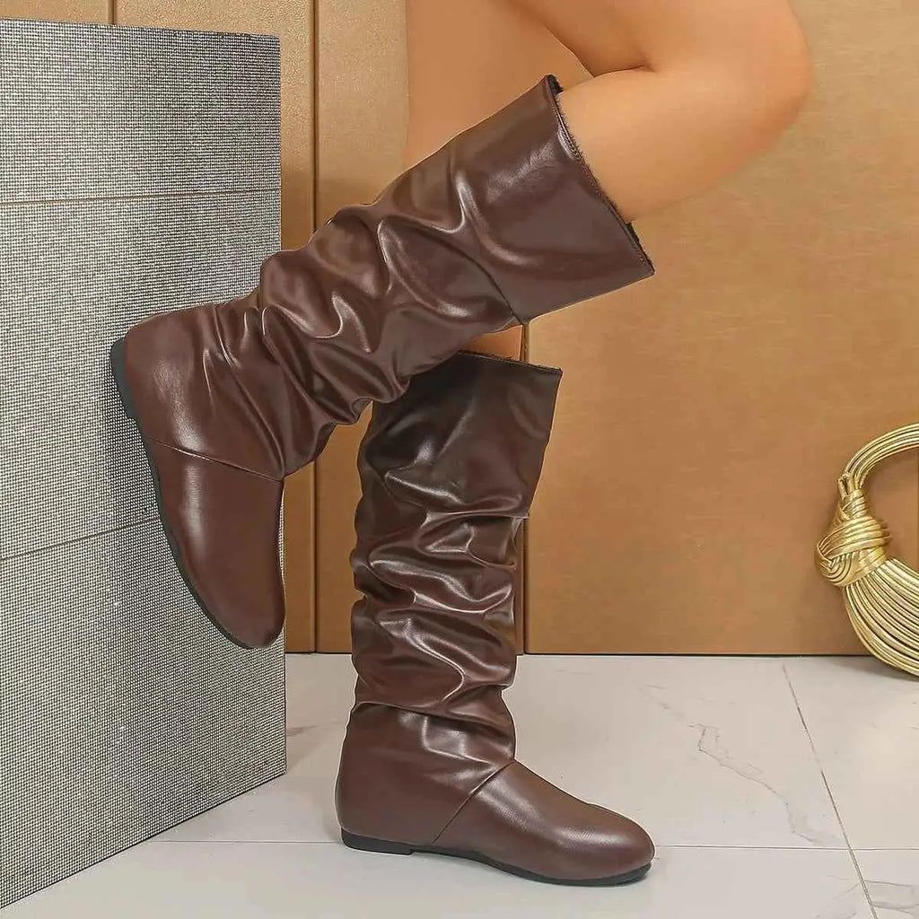 Slouchy Mid-Calf Boots in dark brown PU leather with a slouched design, flat rubber sole, and mid-calf height.