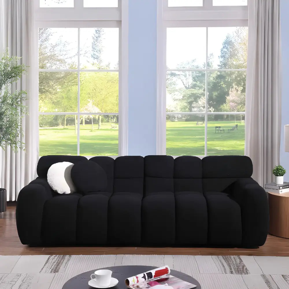 Elegant black boucle sofa for timeless designer living spaces $999 furniture product product information product