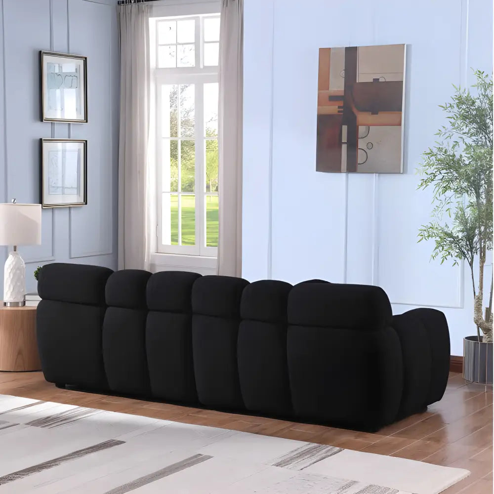 Elegant black boucle sofa for timeless designer living spaces $999 furniture product product information product