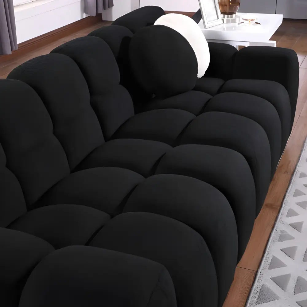 Elegant black boucle sofa for timeless designer living spaces $999 furniture product product information product