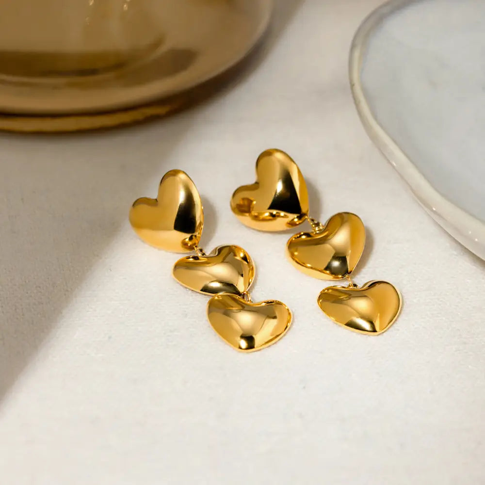 Elevate your style with exquisite stainless steel heart earrings $11.99 1-pair 18k gold-plated, stainless steel care