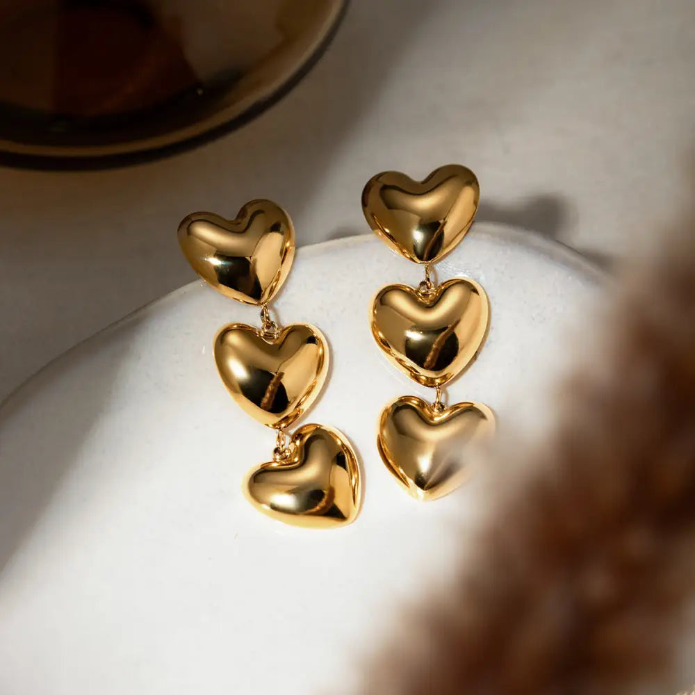 Elevate your style with exquisite stainless steel heart earrings $11.99 1-pair 18k gold-plated, stainless steel care