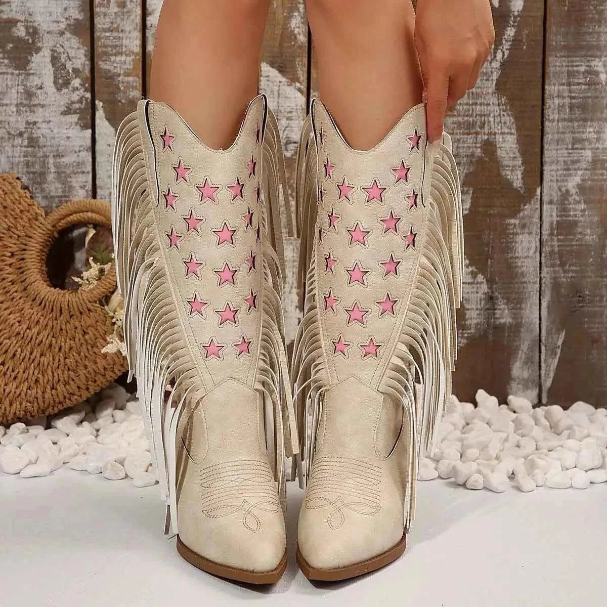Star Fringe mid heel boots in beige suede with pink star embellishments and long side fringes, featuring a pointed toe design.