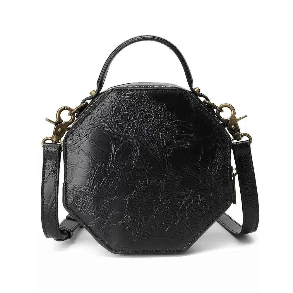 Steampunk Clockwork Crossbody Bag in black PU leather with octagonal shape, textured finish, top handle, and detachable strap.