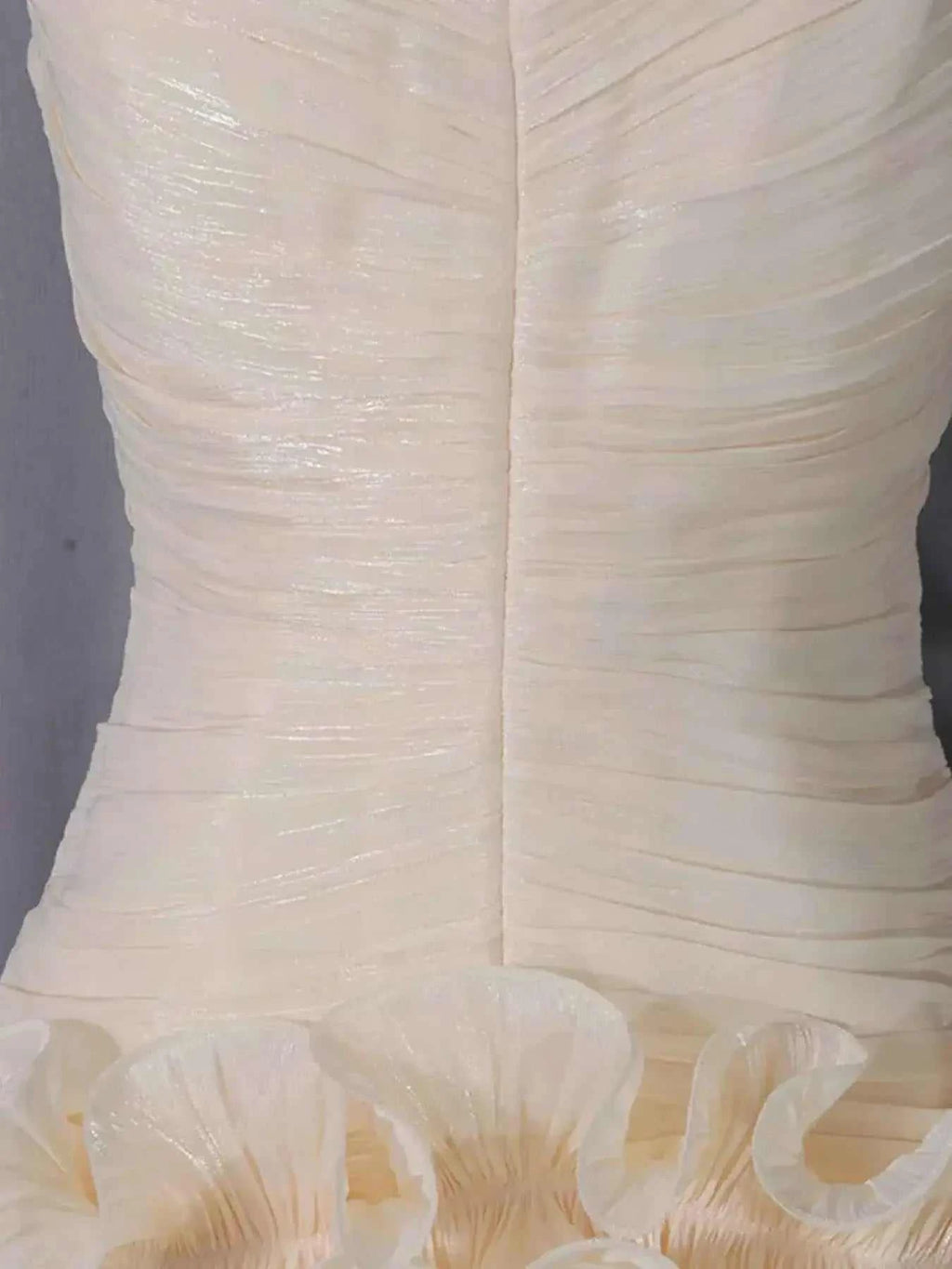 Strapless Ruffle Ruched Mini Dress in cream polyester featuring textured ruched fabric and ruffled hem detailing