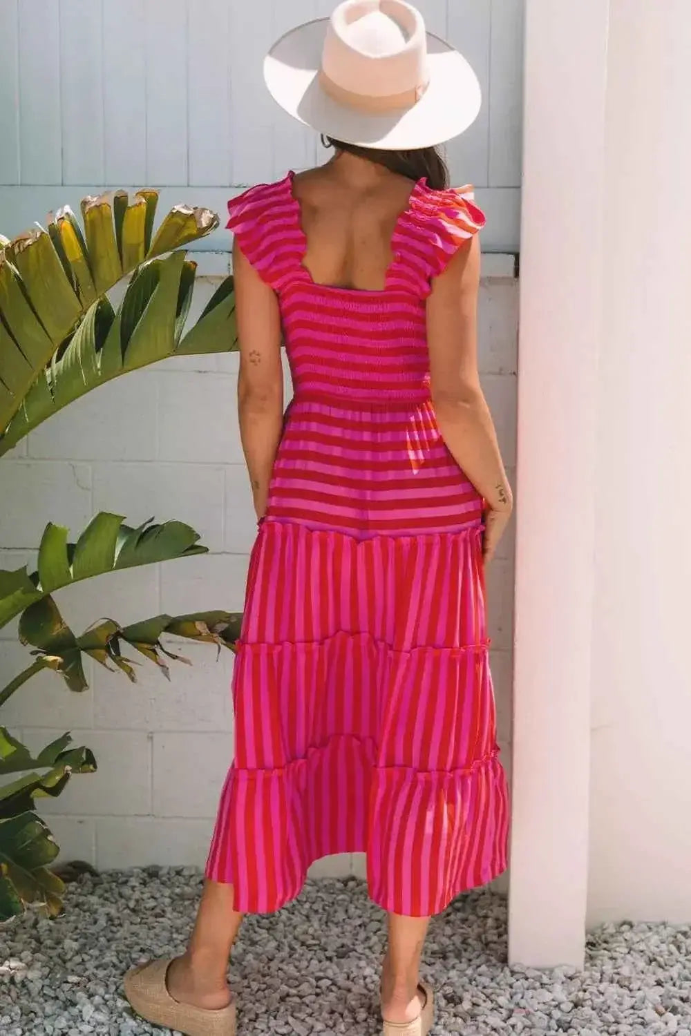 Stripe Flutter Sleeve maxi dress in pink and red horizontal stripes with smocked bodice and tiered ruffle hem