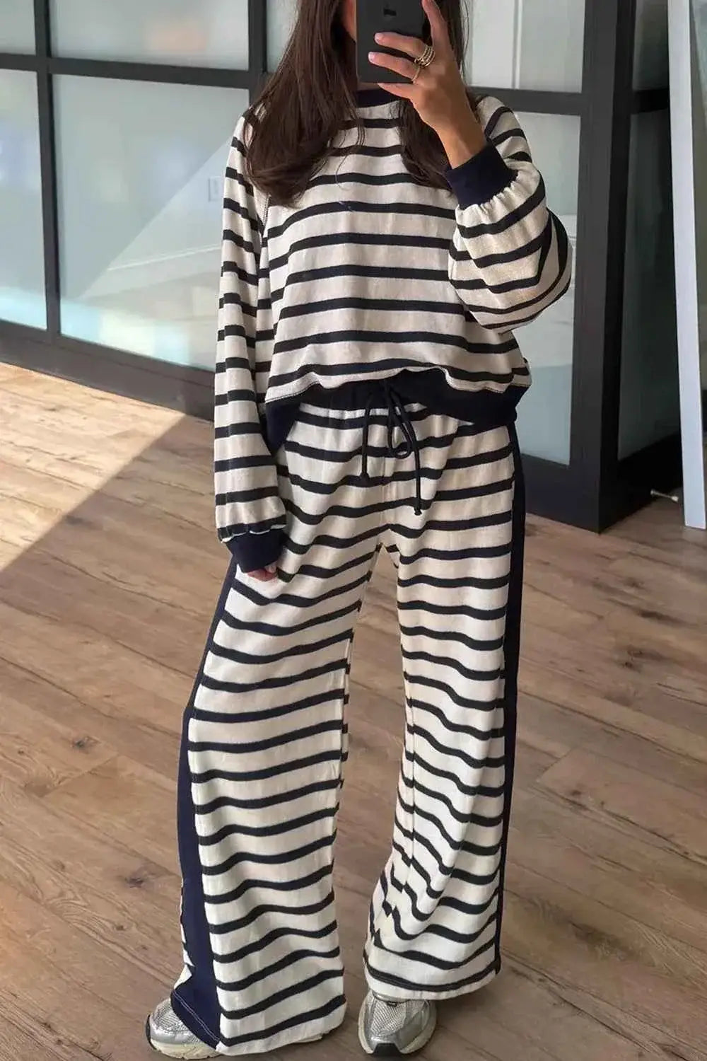 Stripe Relaxed Long Sleeve Top and drawstring pants set in cream with black horizontal stripes and black side panels, relaxed fit