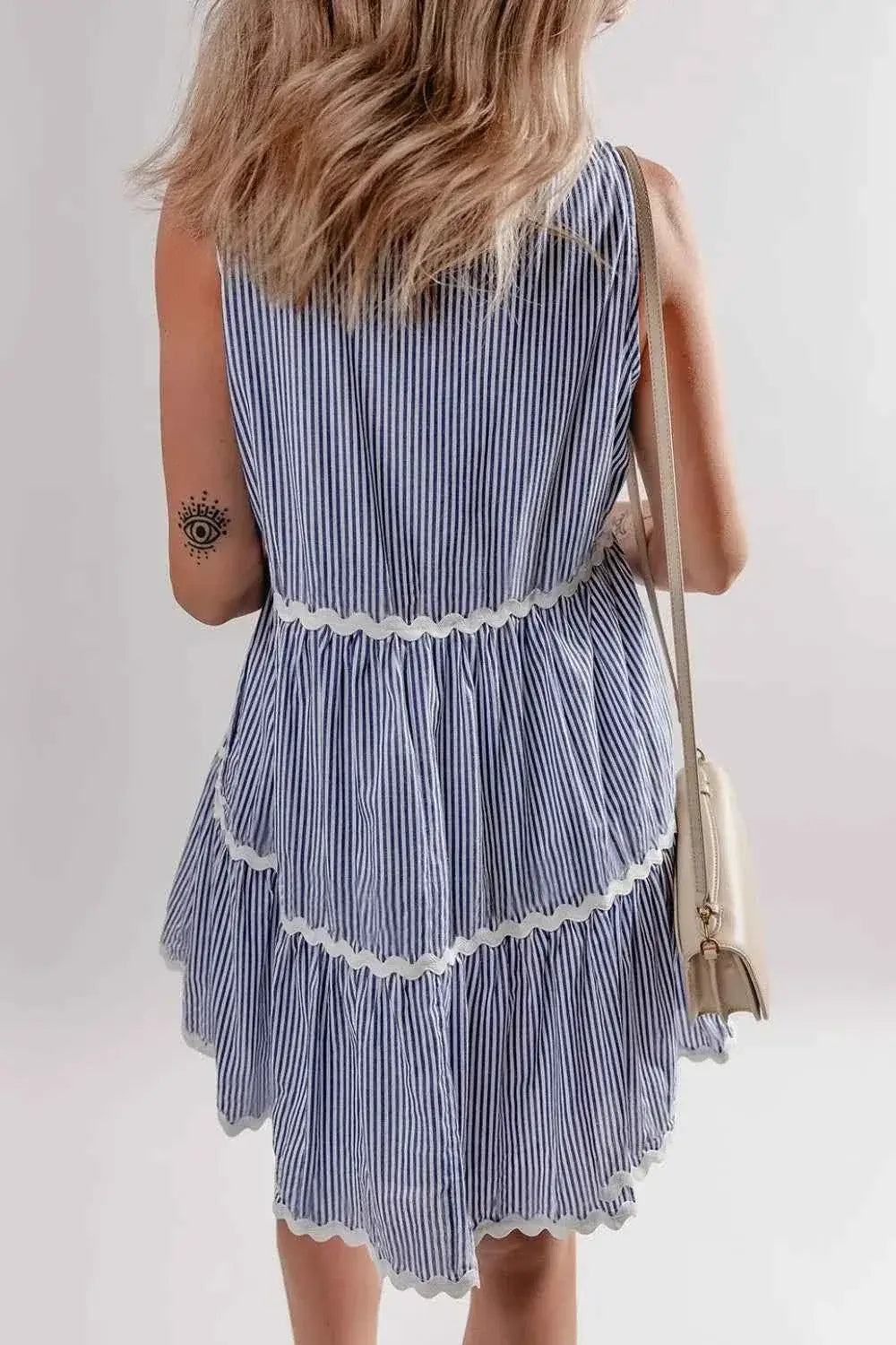 Stripe Sleeveless Notched Ric Rac Mini Dress in blue and white vertical stripes with tiered frill skirt and white ric rac trim
