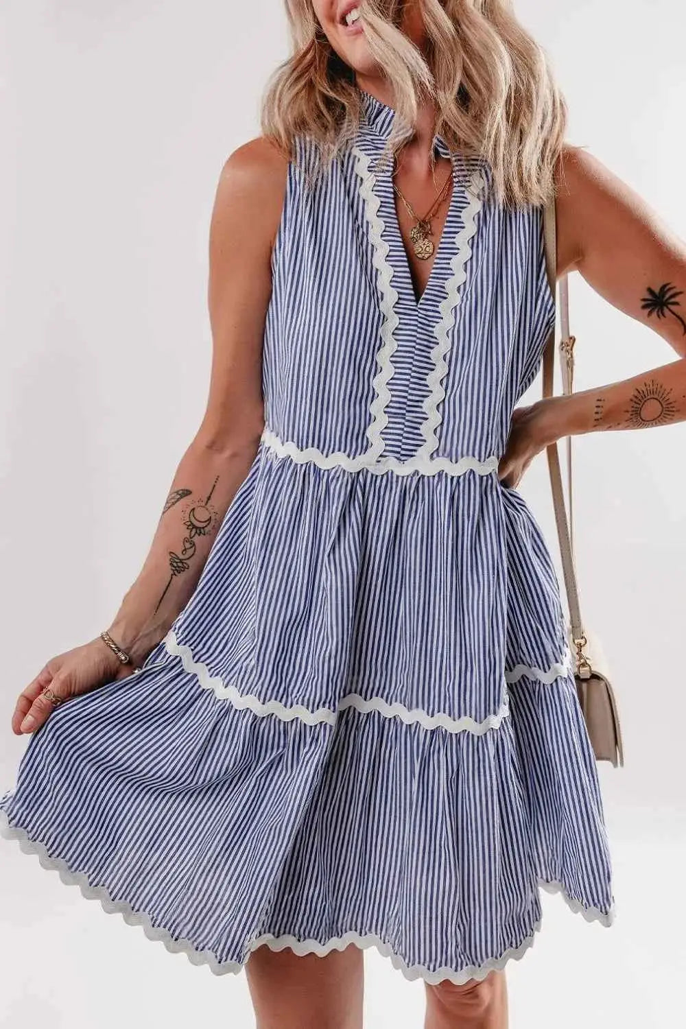 Stripe Sleeveless Notched Ric Rac Mini Dress in blue and white vertical stripes, cotton fabric, tiered skirt and frill ric rac trim