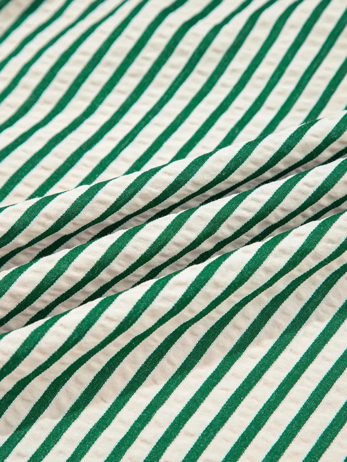 Stripe V Neck dress fabric with green and white vertical stripes in a slightly stretchy texture