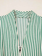 Stripe V Neck midi dress detail showing green and white vertical stripes with zip front and V neckline