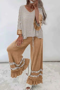 Stripe V Neck Ruffle two-piece outfit with white and black striped V neck top featuring ruffled tan contrast sleeves and matching tan drawstring pants with ruffled hems