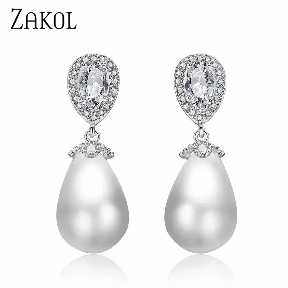 Stylish Teardrop Earrings featuring white imitation pearl teardrop pendants with clear cubic zirconia accents and silver metal settings