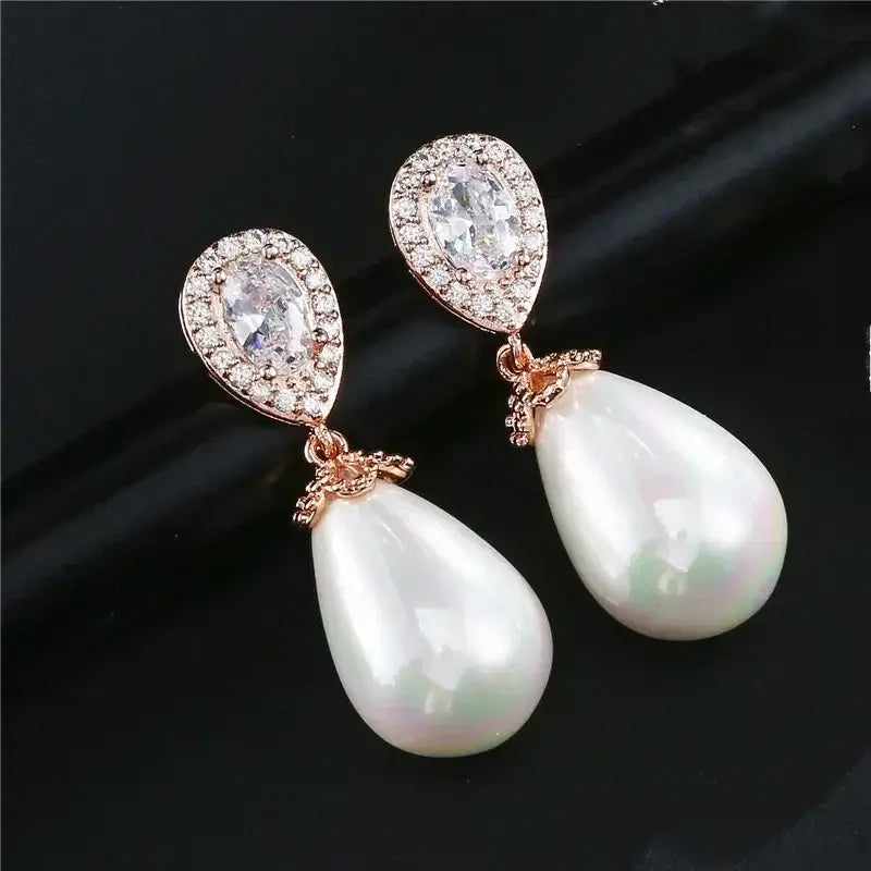 Stylish Teardrop Earrings with white imitation pearl dangles and rose gold cubic zirconia top setting for women