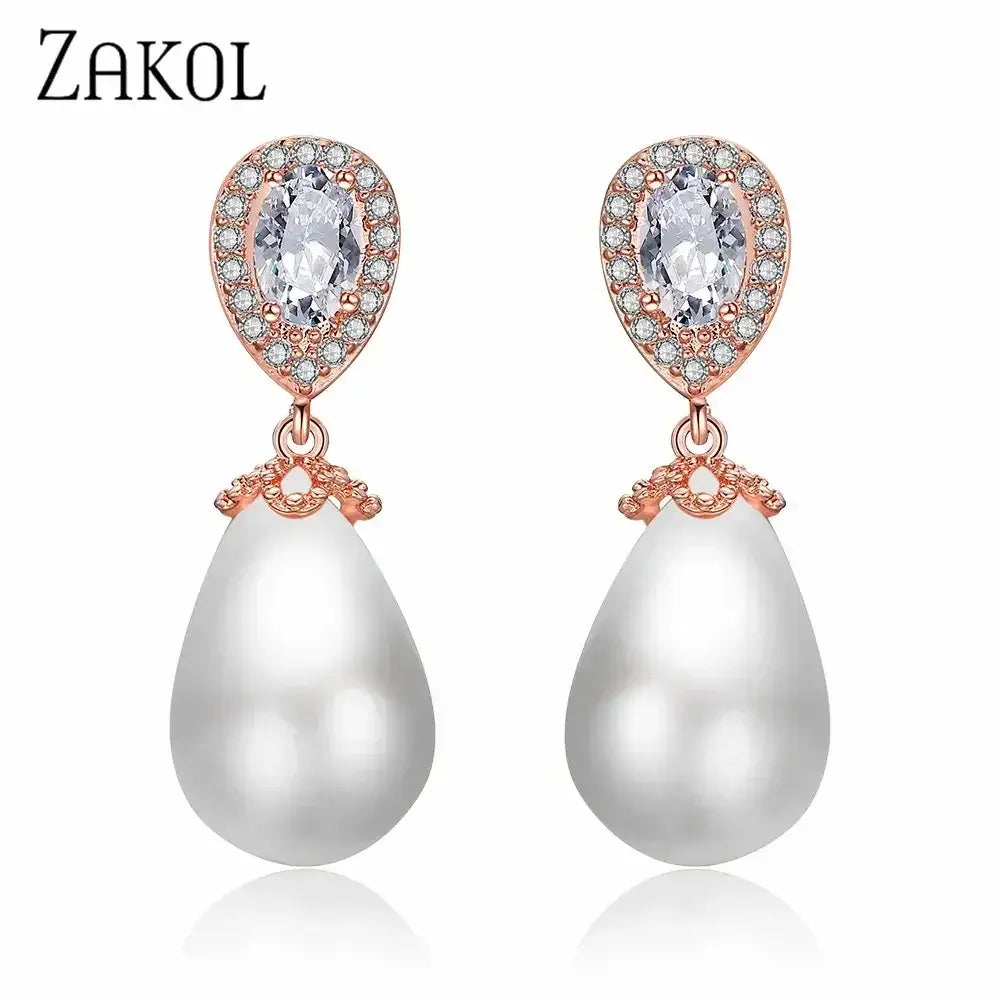 Stylish Teardrop Earrings with rose gold setting, imitation pearl drops, and oval cubic zirconia accents in teardrop shape