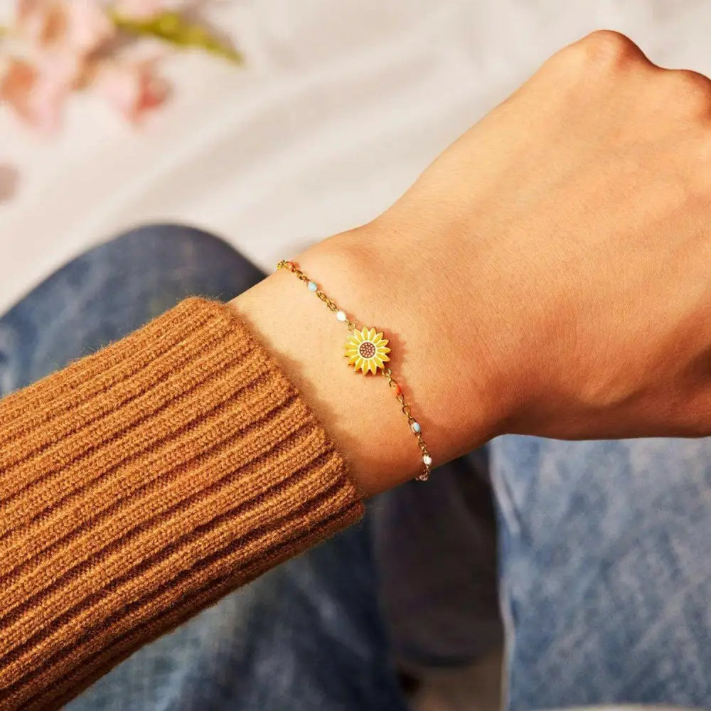 Sunflower elegance 18k gold-plated bracelet for luxury fashion enthusiasts $21 please note that this exquisite