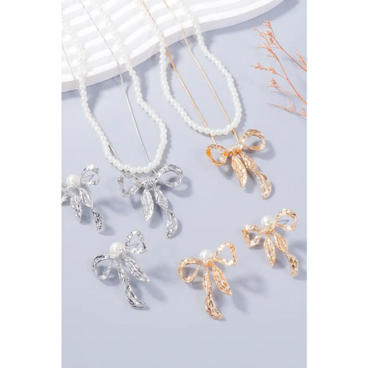 Luxury fashion for woman bow necklace and earring jewelry set $13.99 2-piece synthetic pearl, alloy care to maintain