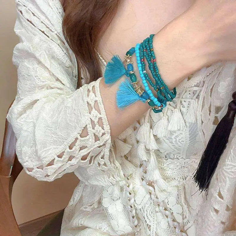 Elevate your style with the tassel rice bead bracelet in luxury fashion $8 1-piece synthetic crystal, rice beads care