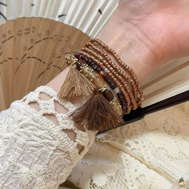 Elevate your style with the tassel rice bead bracelet in luxury fashion $8 1-piece synthetic crystal, rice beads care