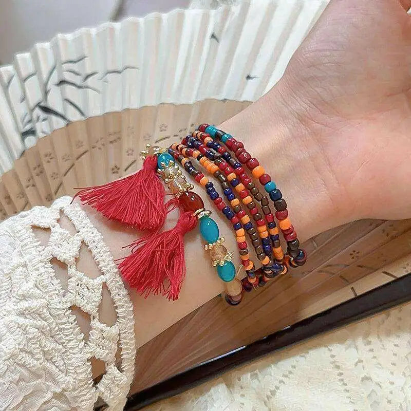 Elevate your style with the tassel rice bead bracelet in luxury fashion $8 1-piece synthetic crystal, rice beads care