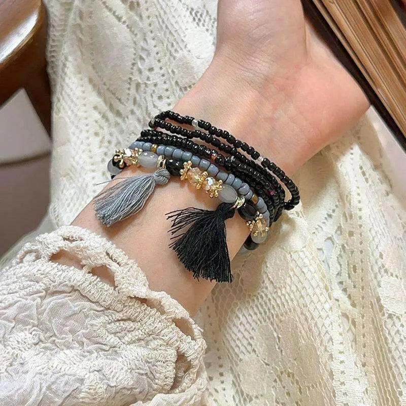 Elevate your style with the tassel rice bead bracelet in luxury fashion $8 1-piece synthetic crystal, rice beads care