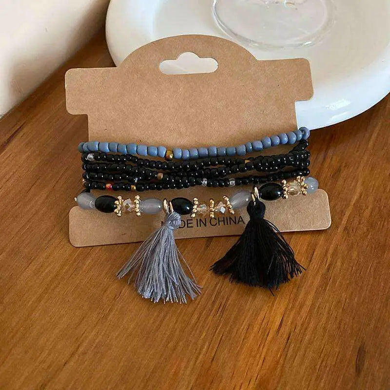 Elevate your style with the tassel rice bead bracelet in luxury fashion $8 1-piece synthetic crystal, rice beads care