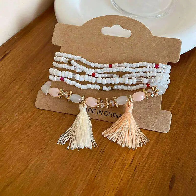 Elevate your style with the tassel rice bead bracelet in luxury fashion $8 1-piece synthetic crystal, rice beads care