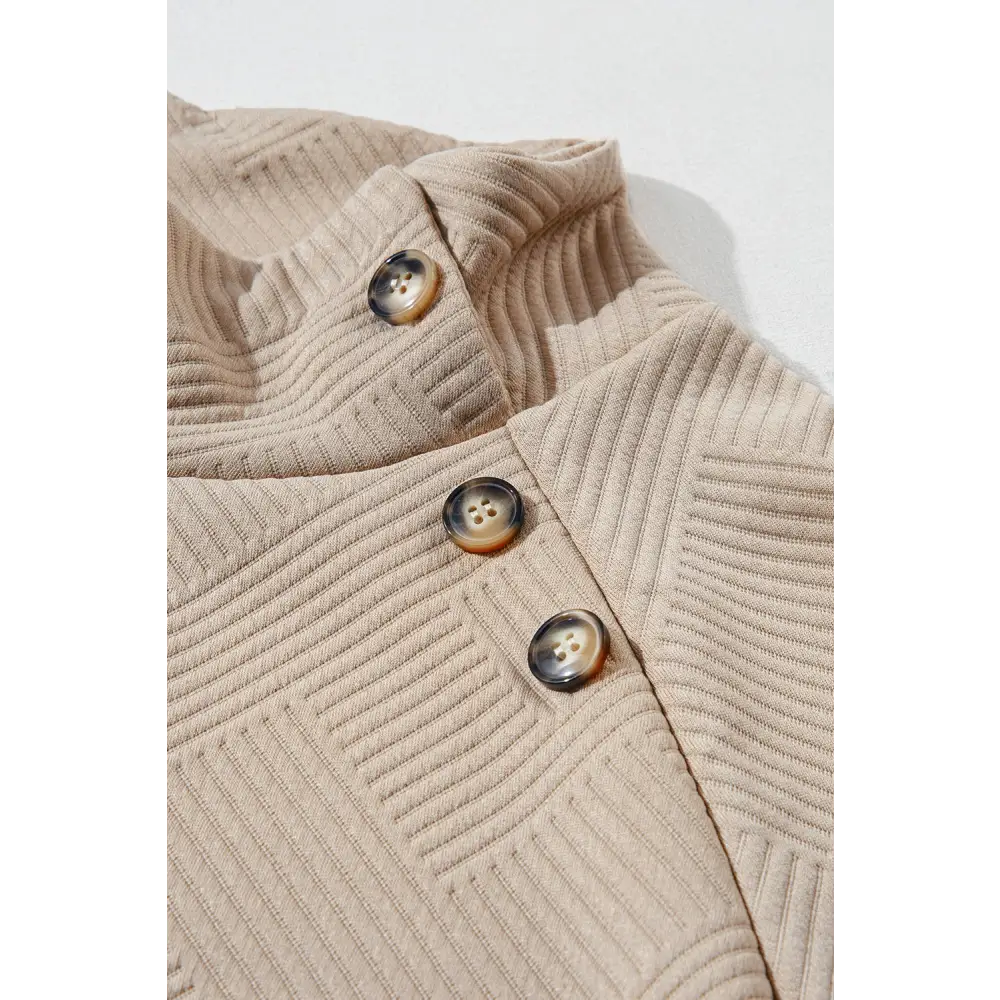 Elevate your wardrobe with a textured turtleneck for luxury fashion $27.99 buttoned – a classic design element