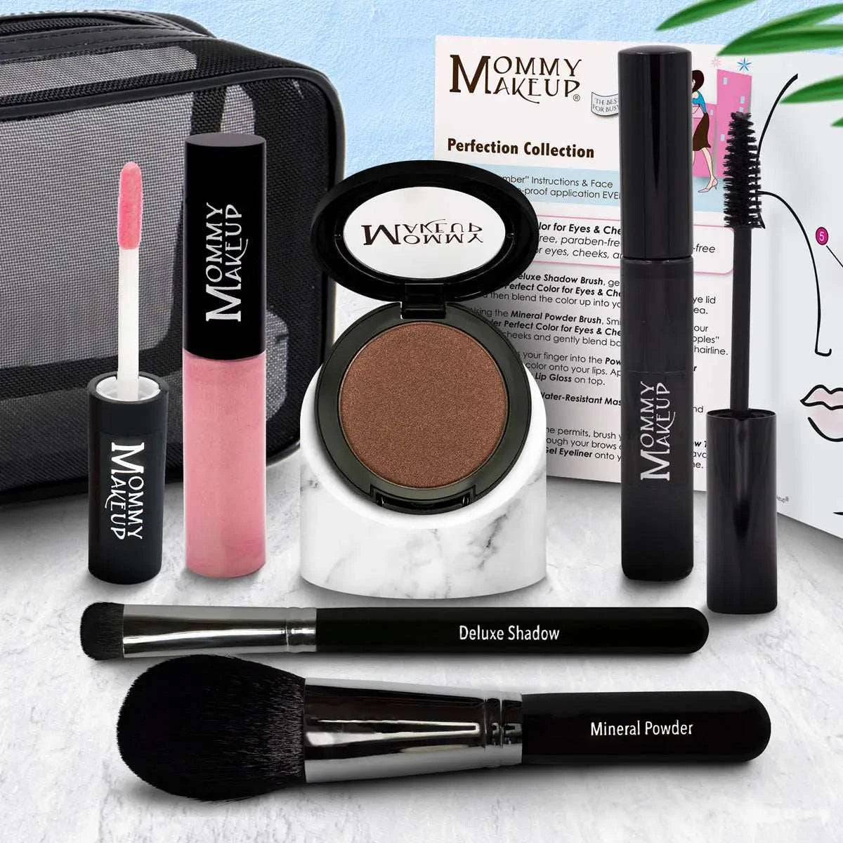 White marble stand holding open brown eyeshadow compact from the perfection collection silicone-free makeup set cruelty free