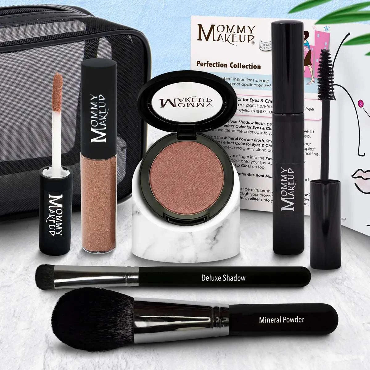 Marble-textured stand holding open eyeshadow compact with warm brownish-pink powder from the perfection collection silicone-free makeup set cruelty free