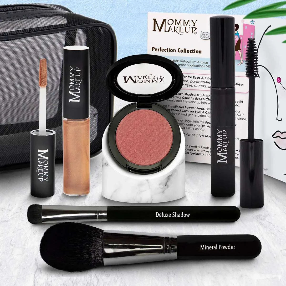 A sleek black and silver makeup brush from the perfection collection in a cruelty free silicone free makeup set