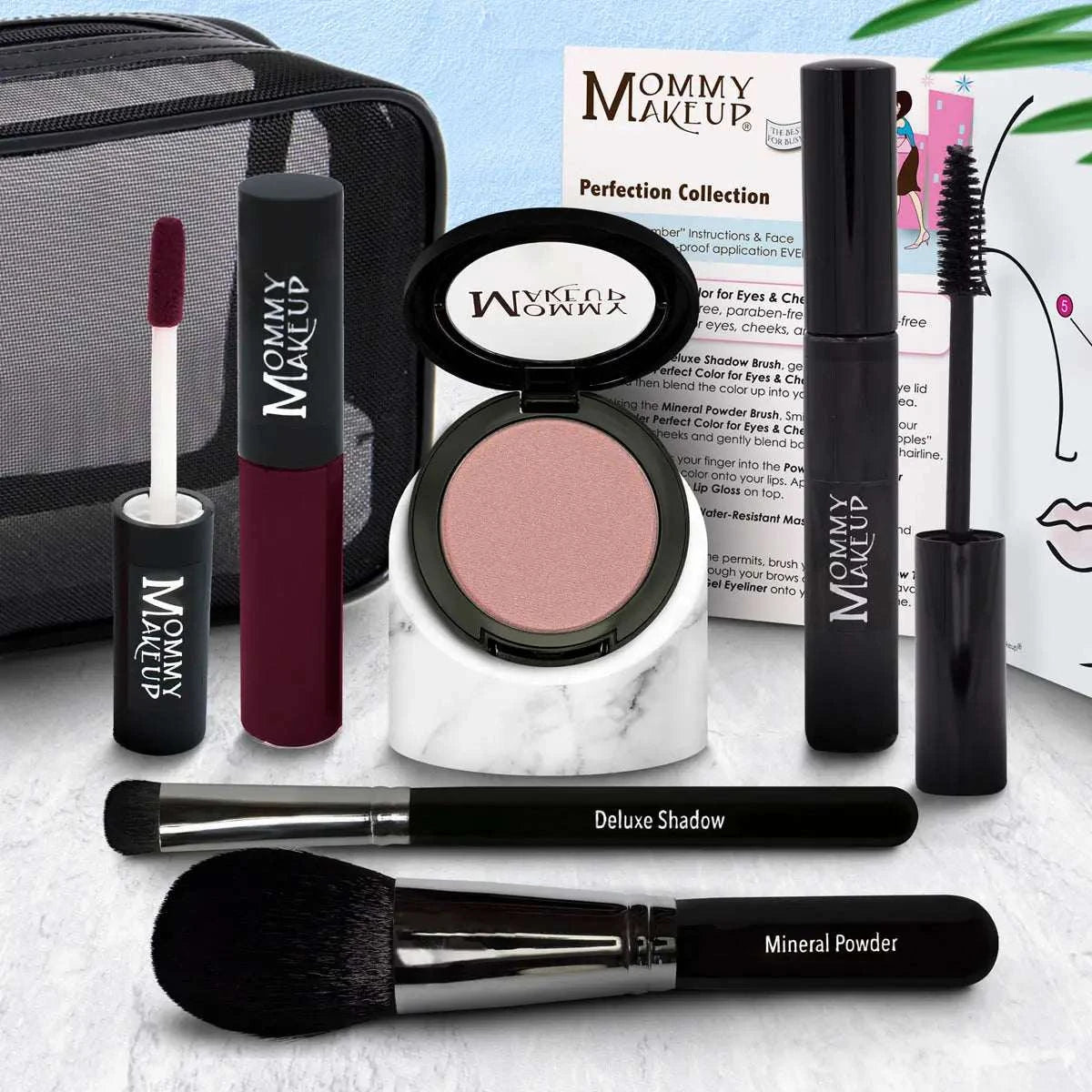 White marble stand displaying a round pink blush compact with black lid from the cruelty free perfection collection silicone-free makeup set