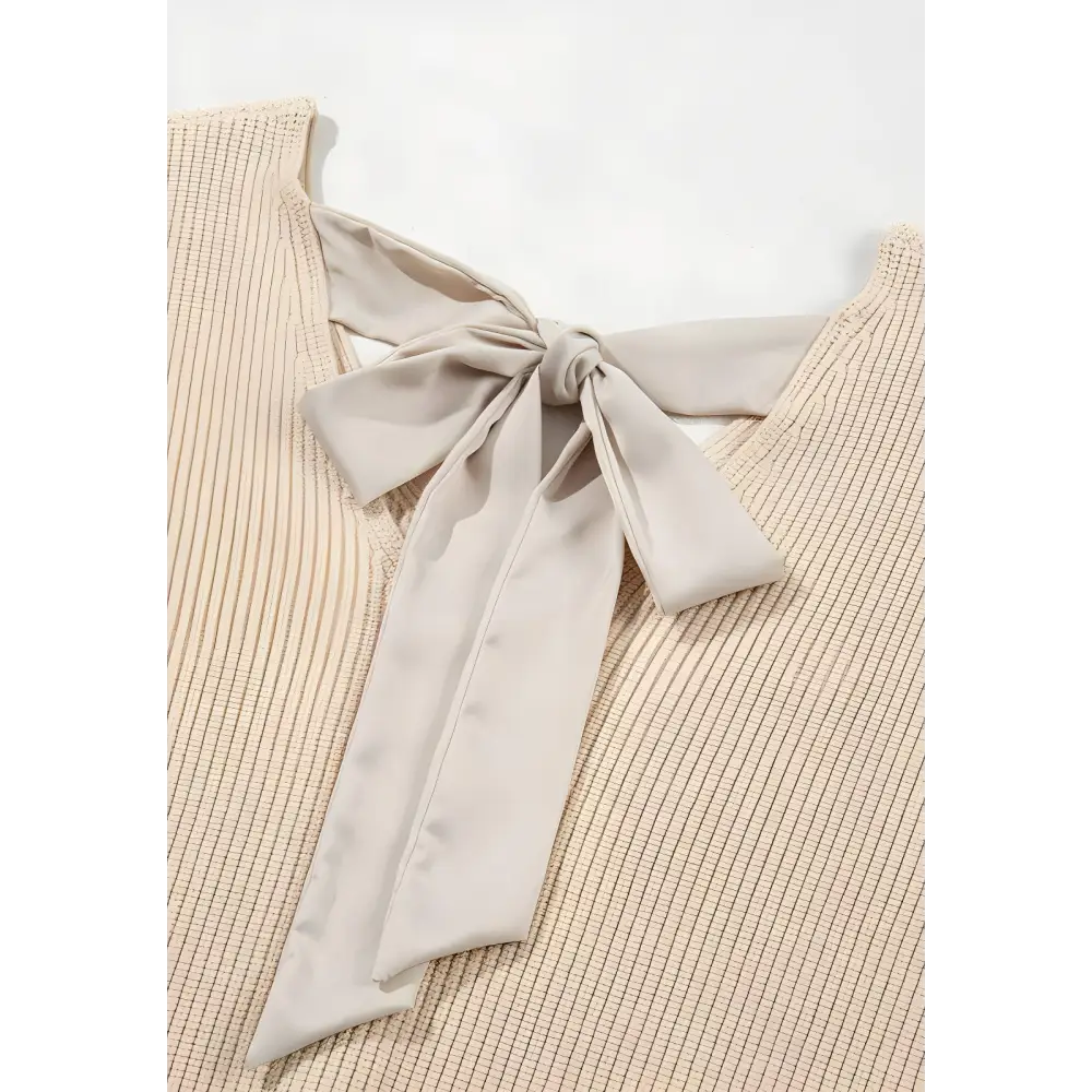 Elevate your look with luxury bow for timeless designer clothing $46.50 bow - a chic bow detail adds a touch