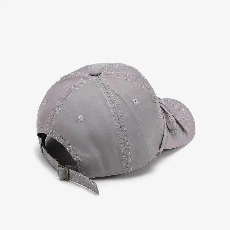 Elevate your style with the tied bow cotton baseball cap in luxury fashion $14.18 1-piece luxurious cotton imported