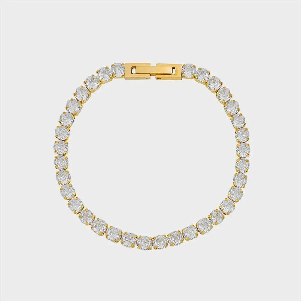 Titanium Steel Bracelet with gold plating and a chain of round clear crystals featuring a secure clasp