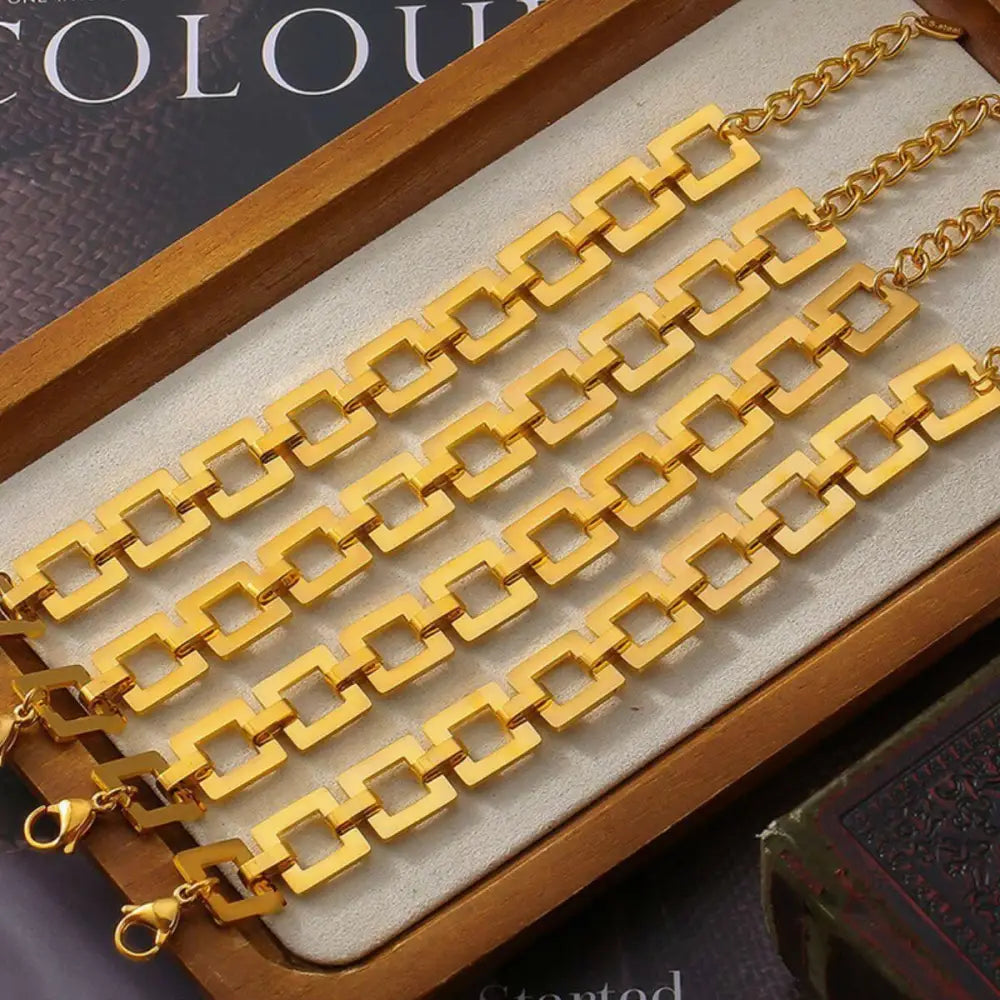 Elevate your style with the titanium steel hollow square bracelet $22 1-piece 18k gold-plated, titanium steel care