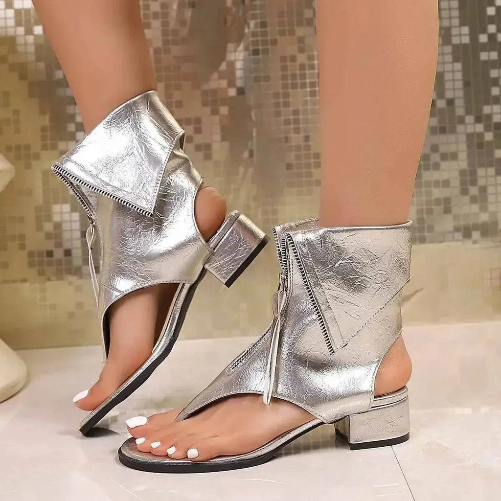 Toe Post Block Heels Sandals in metallic silver PU leather with low block heels and zipper detailing on the ankle strap.